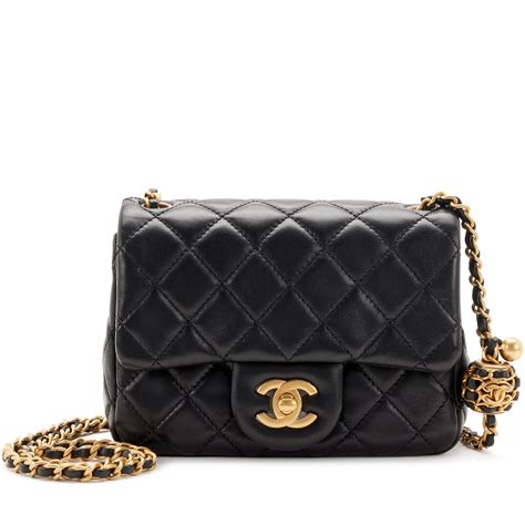 chanel black gold clutch|Chanel black quilted clutch.